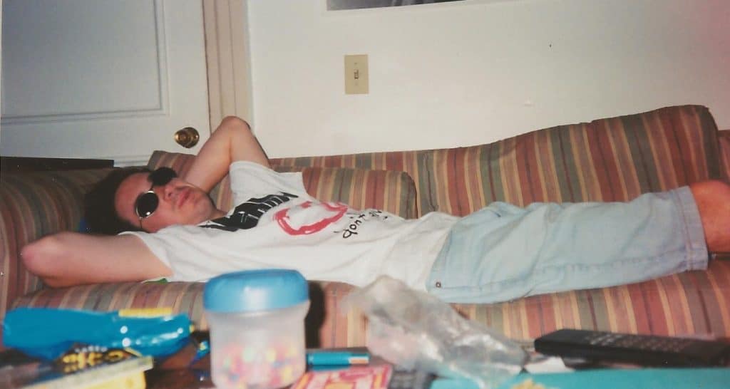 Sabrina Cleary reclining on a couch.